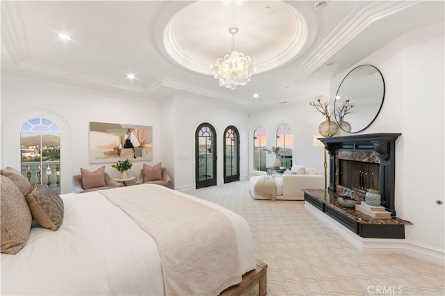 28 Shoreridge, Newport Coast, CA 92657 - carpeted bedroom with a tray ceiling, ornamental molding, a chandelier, recessed lighting, and a premium fireplace