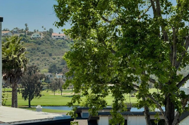 7321 Alicante Rd Unit A, Carlsbad, CA 92009 - view of home's community featuring a water view, a lawn, and view of golf course