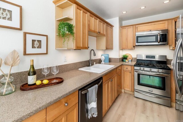 7321 Alicante Rd Unit A, Carlsbad, CA 92009 - kitchen featuring stainless steel appliances, a sink, light wood finished floors, open shelves, and recessed lighting