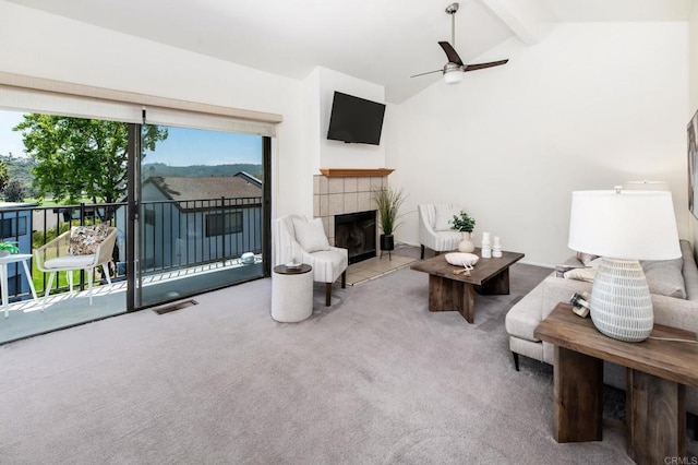 7321 Alicante Rd Unit A, Carlsbad, CA 92009 - living room featuring carpet flooring, ceiling fan, and a tile fireplace