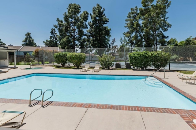 7321 Alicante Rd Unit A, Carlsbad, CA 92009 - community pool featuring a hot tub and a patio area