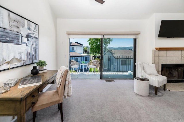 7321 Alicante Rd Unit A, Carlsbad, CA 92009 - carpeted office space with a tile fireplace
