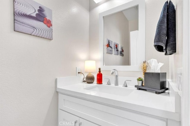 73 Melrose Dr, Mission Viejo, CA 92692 - bathroom featuring vanity and a textured wall