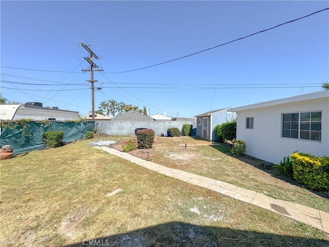 view of yard with a shed and an outdoor structure