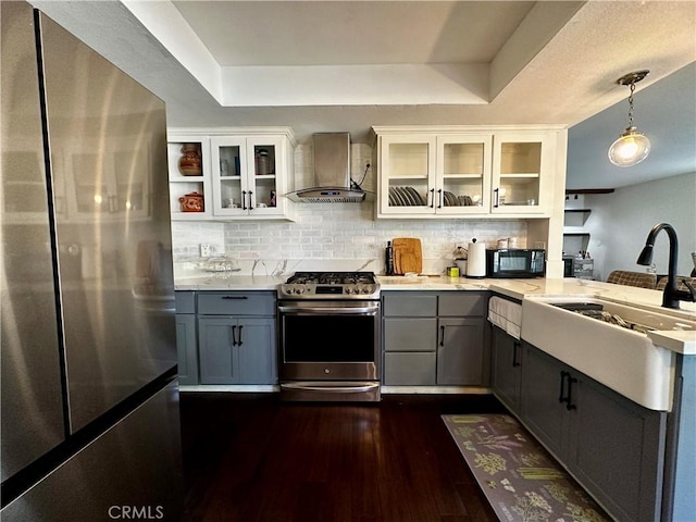 1512 W Sunnyview Dr, Rialto, CA 92377 - kitchen featuring stainless steel appliances, wall chimney range hood, gray cabinetry, and light countertops