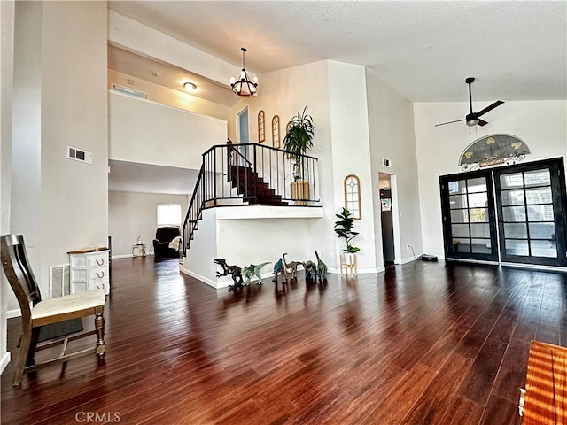 1512 W Sunnyview Dr, Rialto, CA 92377 - entrance foyer with a high ceiling, stairs, hardwood / wood-style floors, and baseboards
