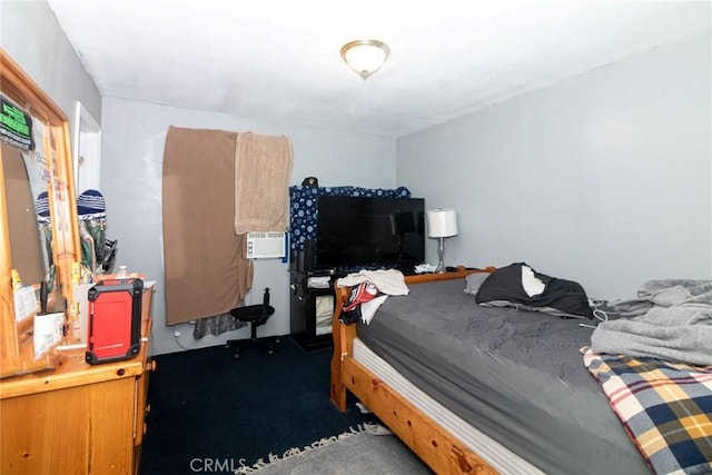 carpeted bedroom with cooling unit