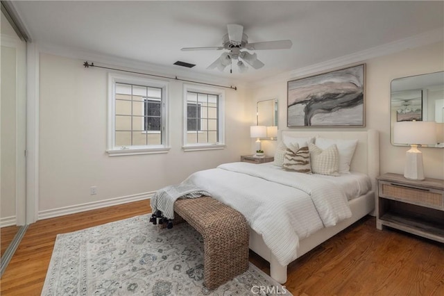 339 Via Lido Soud, Newport Beach, CA 92663 - bedroom featuring ornamental molding, wood finished floors, baseboards, and a ceiling fan