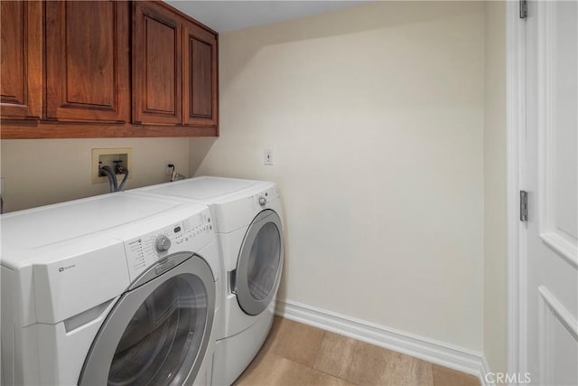 339 Via Lido Soud, Newport Beach, CA 92663 - laundry area with cabinet space, separate washer and dryer, and baseboards