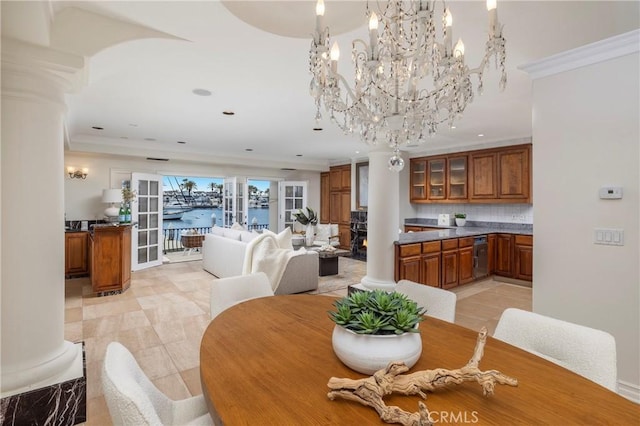 339 Via Lido Soud, Newport Beach, CA 92663 - dining room with decorative columns, ornamental molding, a chandelier, recessed lighting, and a water view