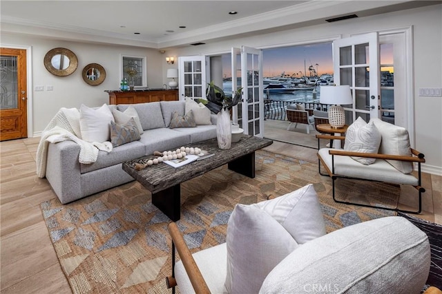 339 Via Lido Soud, Newport Beach, CA 92663 - living area with crown molding, wood finished floors, french doors, and baseboards