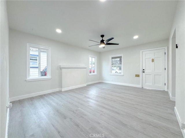 5557 Lemon Ave, Long Beach, CA 90805 - unfurnished living room with a ceiling fan, wood finished floors, baseboards, and recessed lighting