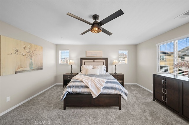 27490 Grand Teton Ct, Menifee, CA 92585 - bedroom with multiple windows and light colored carpet