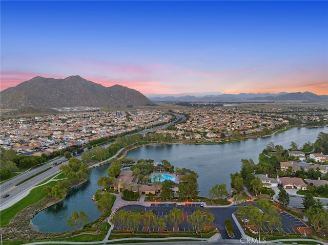 27490 Grand Teton Ct, Menifee, CA 92585 - aerial overview of property's location with a water and mountain view and nearby suburban area