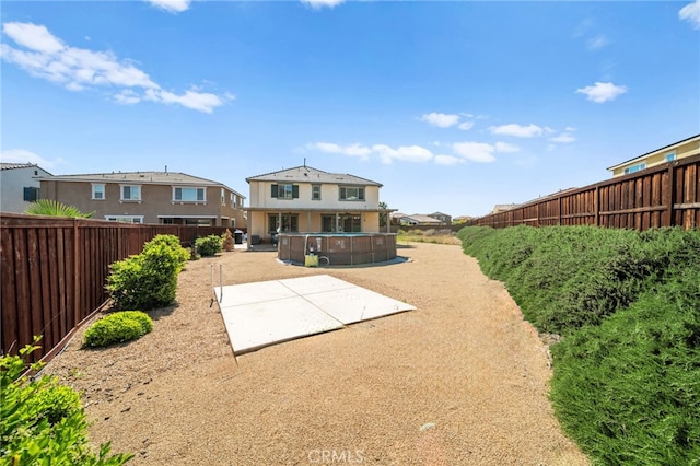 27490 Grand Teton Ct, Menifee, CA 92585 - back of house with a patio and a fenced backyard