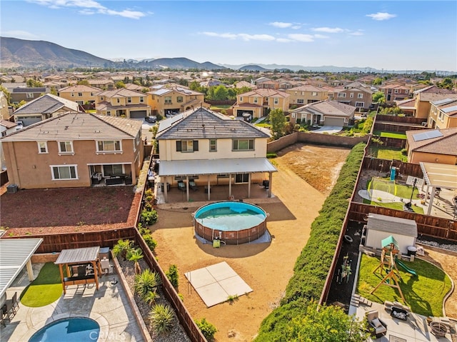 27490 Grand Teton Ct, Menifee, CA 92585 - aerial view of residential area featuring a pool area and mountains