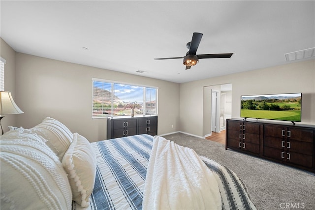 27490 Grand Teton Ct, Menifee, CA 92585 - bedroom with light colored carpet, baseboards, and ceiling fan