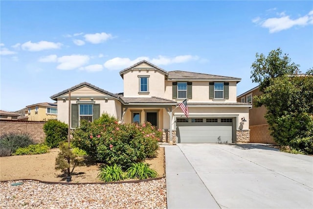 27490 Grand Teton Ct, Menifee, CA 92585 - traditional home with stucco siding, driveway, an attached garage, and stone siding
