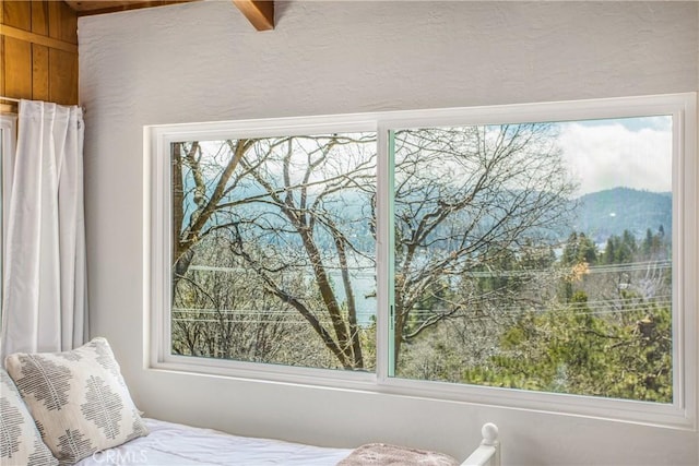 28834 Zion Dr, Lake Arrowhead, CA 92352 - bedroom featuring multiple windows and beamed ceiling