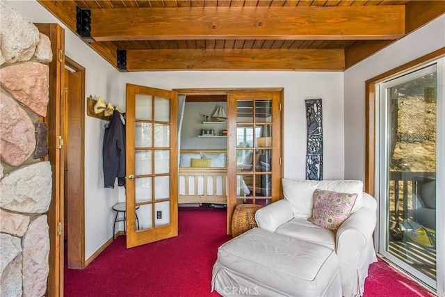 28834 Zion Dr, Lake Arrowhead, CA 92352 - living area featuring carpet flooring, beamed ceiling, and wooden ceiling