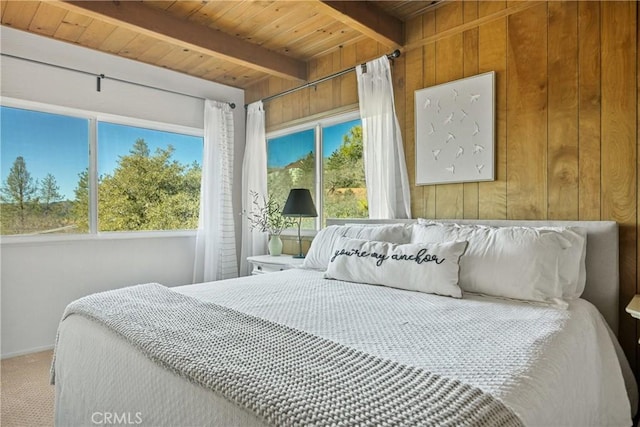 28834 Zion Dr, Lake Arrowhead, CA 92352 - carpeted bedroom with wooden ceiling, beam ceiling, wooden walls, and multiple windows