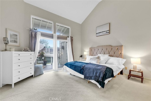 7402 Yellowtail Dr Unit 204, Huntington Beach, CA 92648 - bedroom with access to exterior, carpet, and high vaulted ceiling
