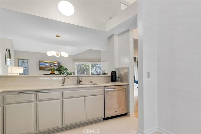 7402 Yellowtail Dr Unit 204, Huntington Beach, CA 92648 - kitchen featuring dishwasher, light countertops, pendant lighting, light tile patterned flooring, and white cabinetry