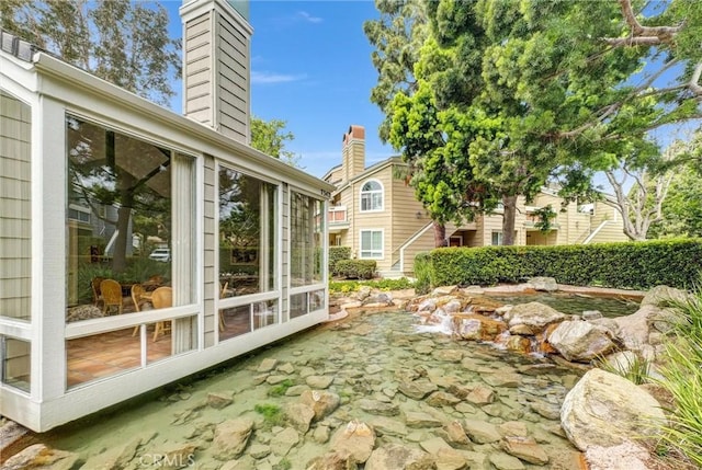 7402 Yellowtail Dr Unit 204, Huntington Beach, CA 92648 - view of patio with a sunroom
