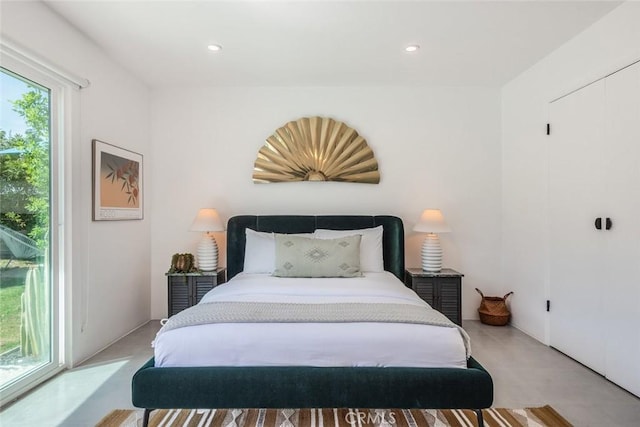 bedroom featuring access to outside and recessed lighting