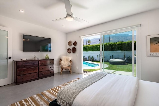 bedroom with access to outside, ceiling fan, and recessed lighting