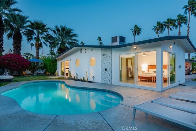 swimming pool featuring a patio