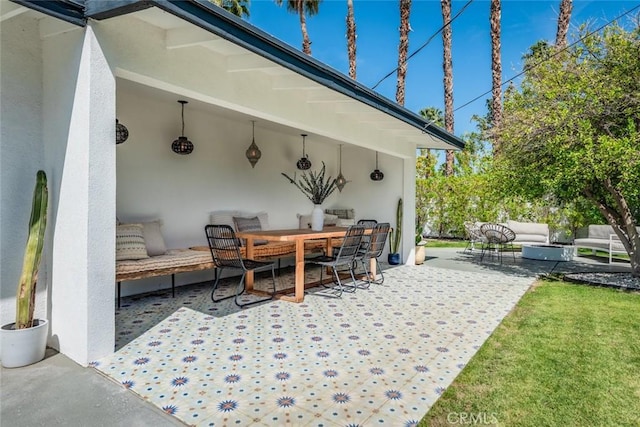 view of patio / terrace featuring an outdoor hangout area and outdoor dining space