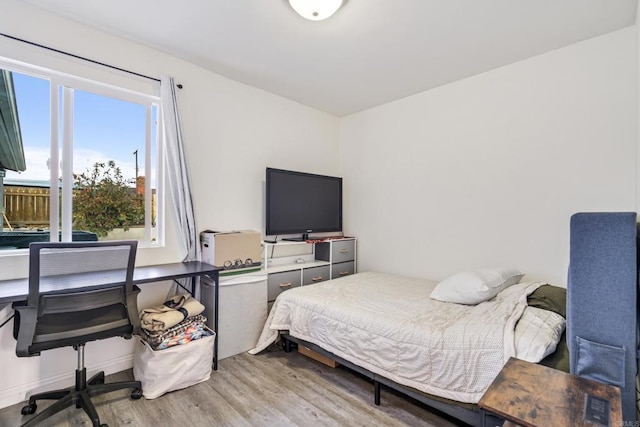 2045 Cardinal Dr, San Diego, CA 92123 - bedroom with light wood-style floors and an office area