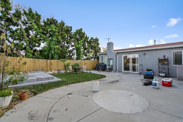 2045 Cardinal Dr, San Diego, CA 92123 - view of patio with a fenced backyard