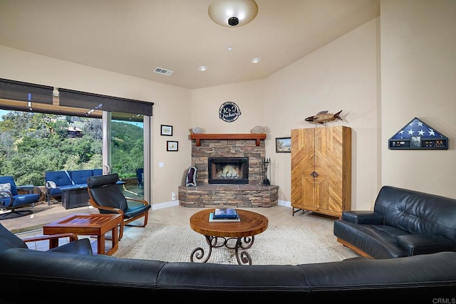 2021 Willow Glen Rd, Fallbrook, CA 92028 - tiled living room with a stone fireplace, baseboards, and recessed lighting