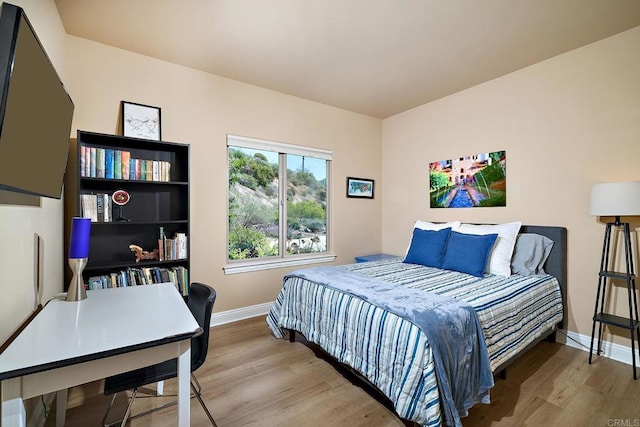 2021 Willow Glen Rd, Fallbrook, CA 92028 - bedroom with baseboards and wood finished floors