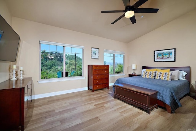 2021 Willow Glen Rd, Fallbrook, CA 92028 - bedroom featuring light wood-style floors, baseboards, vaulted ceiling, and a ceiling fan