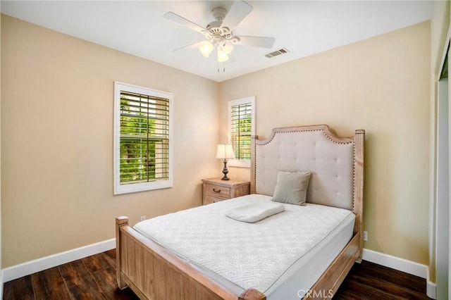 7 Honeydew, Irvine, CA 92603 - bedroom featuring baseboards, dark wood-type flooring, and a ceiling fan