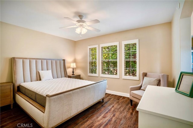 7 Honeydew, Irvine, CA 92603 - bedroom with dark wood-style flooring, baseboards, and a ceiling fan