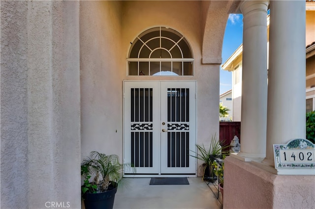 14028 Yorktown Ct, Fontana, CA 92336 - property entrance with french doors and stucco siding