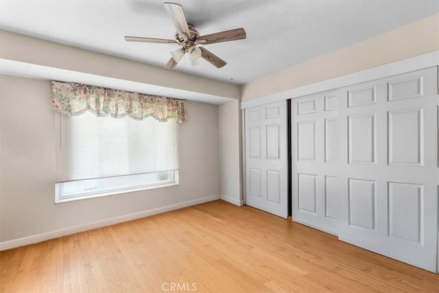 2522 S Calaveras Pl, Ontario, CA 91761 - unfurnished bedroom featuring baseboards, light wood-style floors, a closet, and a ceiling fan