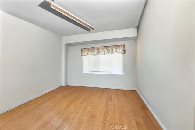 2522 S Calaveras Pl, Ontario, CA 91761 - unfurnished room with wood finished floors and baseboards