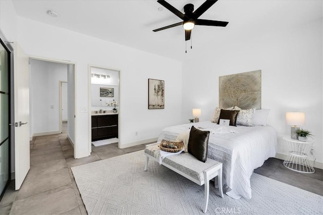 3773 Mission, Peak, Palm Springs, CA 92262 - bedroom with baseboards, a ceiling fan, ensuite bath, and concrete flooring