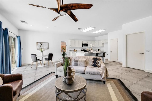 3773 Mission, Peak, Palm Springs, CA 92262 - living area with light tile patterned flooring, ceiling fan, baseboards, and recessed lighting