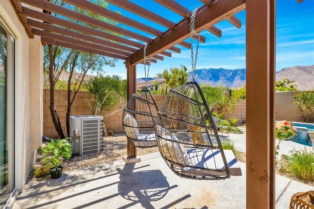 3773 Mission, Peak, Palm Springs, CA 92262 - view of patio / terrace featuring central AC unit, a mountain view, a fenced backyard, and a pergola