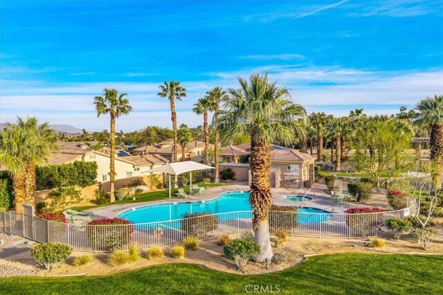 3773 Mission, Peak, Palm Springs, CA 92262 - community pool with fence, a community hot tub, and a patio area