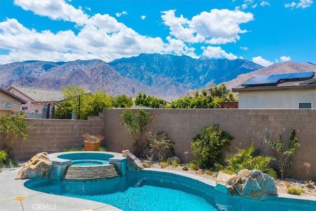 3773 Mission, Peak, Palm Springs, CA 92262 - view of swimming pool with a mountain view, a fenced backyard, and a pool with connected hot tub