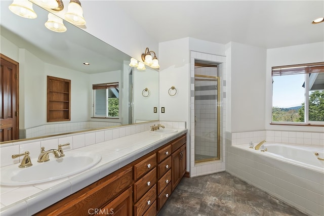 27513 St Bernard Ln, Lake Arrowhead, CA 92352 - full bath with double vanity, a garden tub, a stall shower, a chandelier, and stone finish floors