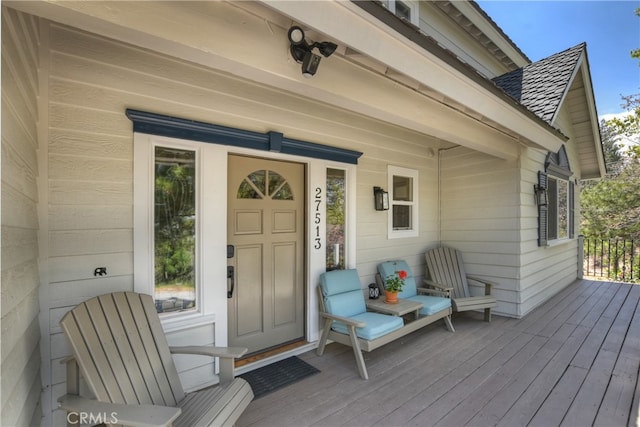 27513 St Bernard Ln, Lake Arrowhead, CA 92352 - view of exterior entry with a porch