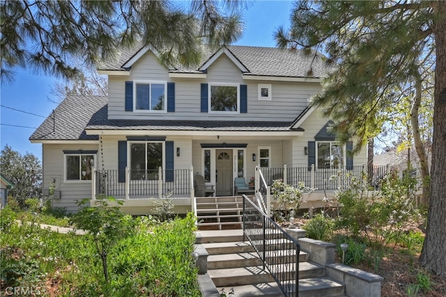 27513 St Bernard Ln, Lake Arrowhead, CA 92352 - view of front of house with a porch, stairway, and roof with shingles